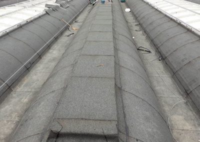 Viscogum grey mineral membrane on prefabricated building
