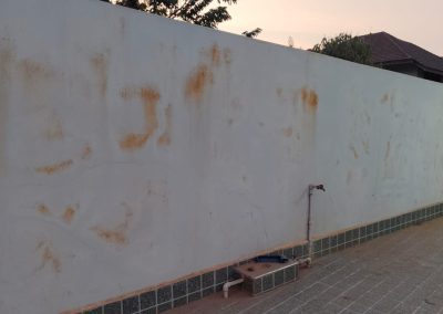 Acryrubber on facade wall in Laos - before