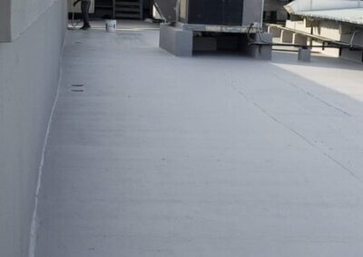 Rooftop waterproofing application with Acryroof Plus FIbro