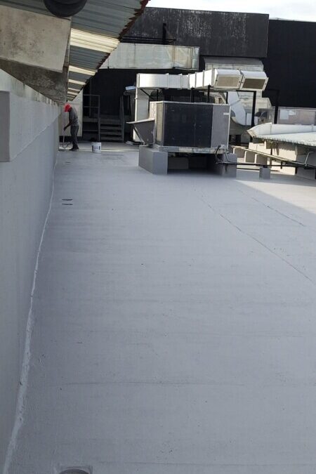 Rooftop waterproofing application with Acryroof Plus FIbro